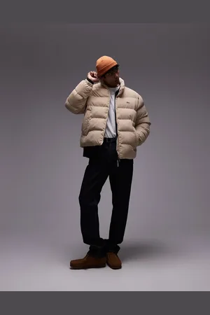 Lacoste – Wattierte Pufferjacke aus Cord in Beige
