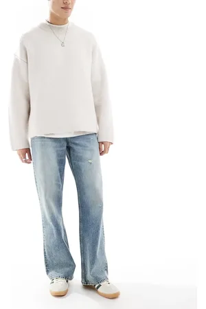 ASOS – Weite Schlagjeans in hellblauer Waschung