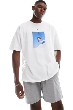 ASOS – Pyjama in Weiß mit Snowboard-Print