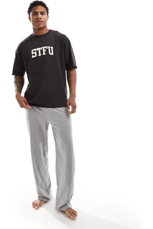 ASOS – Pyjama in Schwarz mit „STFU“-Schriftzug
