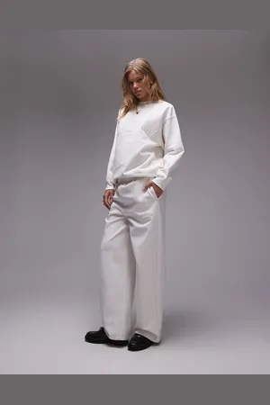 Topshop – Stockholm – Jogginghose in Ecru mit geradem Bein und Grafik, Kombiteil