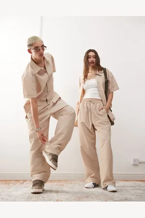 Reclaimed – Weite Unisex-Hose in Steinbeige mit Kontrastnaht