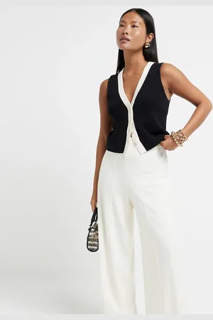River Island Petite – Bundfaltenhose in Creme mit weitem Bein
