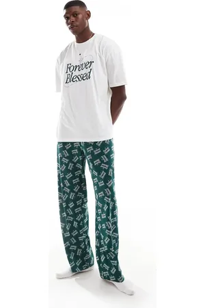 ASOS – Pyjama mit „Forever Blessed“-Grafiken in Dunkelgrün