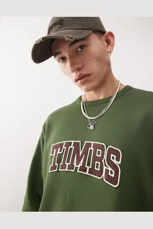 Timberland – Bouclé-Sweatshirt in Dunkelgrün mit Schriftzug-Logo auf der Brust