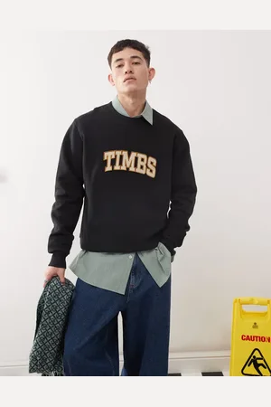 Timberland – Bouclé-Sweatshirt in mit Schriftzug-Logo auf der Brust