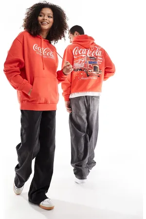 ASOS – Christmas – Weihnachtlicher Unisex-Pullover in mit festlichem Coca Cola-Print und Oversize-Passform