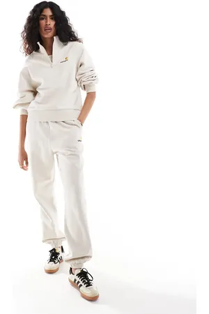 Carhartt – American Script – Jogginghose in Creme, Kombiteil
