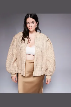 ASOS Curve – Verzierte Bomberjacke aus Bouclé in Gold