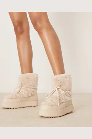 New Look – Flauschige Schneestiefel in Cremeweiß