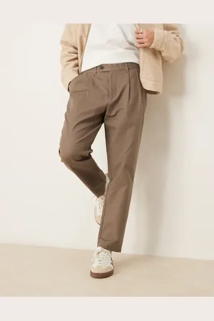 SELECTED – Adam – Schmal zulaufende Hose in Hellbraun mit Bundfalten