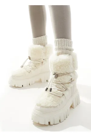 South Beach – Schnürstiefel aus Kunstpelz in mit klobiger Sohle
