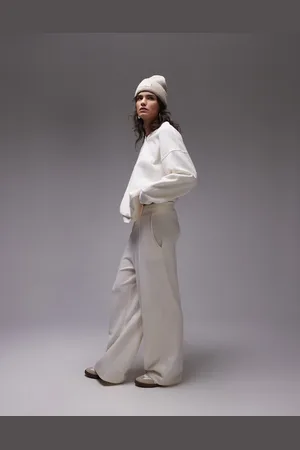 Topshop – Angeraute Jogginghose in Creme mit weitem Bein
