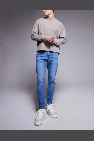 River Island – Schmal geschnittene Jeans in Mittelblau