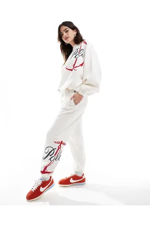 Ralph Lauren – Jogginghose in Cremeweiß mit Marine-Logoprint, Kombiteil