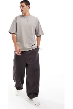 ASOS – Schwere Jogginghose in Dunkelbraun mit Ballonschnitt