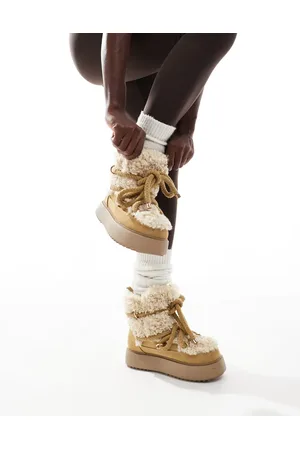 ASOS – Alpine – Schneestiefel zum Schnüren in Beige mit Lammfellimitat