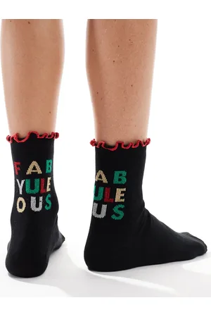ASOS – Weihnachten – Socken in mit Weihnachtsspruch und Rüschenrand