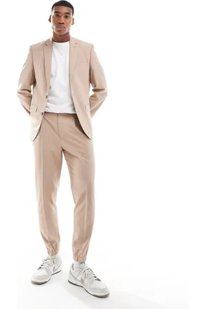 ASOS – Schmal zulaufende Anzug-Jogginghose in Beige