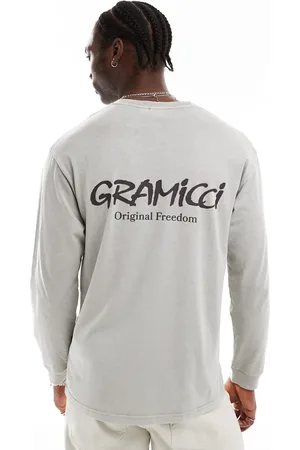 Gramicci – Langärmliges T-Shirt in pigmentiertem Salbeigrün mit „Original Freedom“-Grafik
