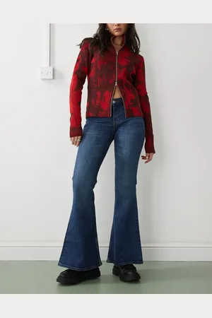 Monki – Katsumi – Bootcut-Jeans in dunkler meerblauer Waschung mit ausgestelltem Bein und niedrigem Bund