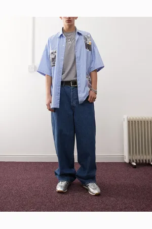 COLLUSION – X002 – Baggy-Jeans in mittelblauer Waschung