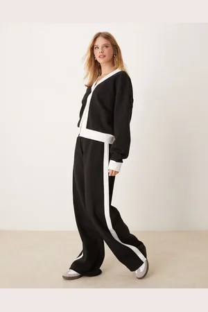 ASOS ASOS – Weit geschnittene Jogginghose in mit farblich abgesetztem, seitlichem Bahneinsatz, Kombiteil