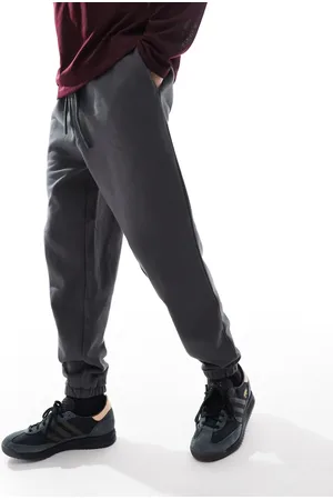 ASOS – Hochwertige, schmal zulaufende, schwere Jogginghose in verwaschenem Schwarz, 400 g/m²