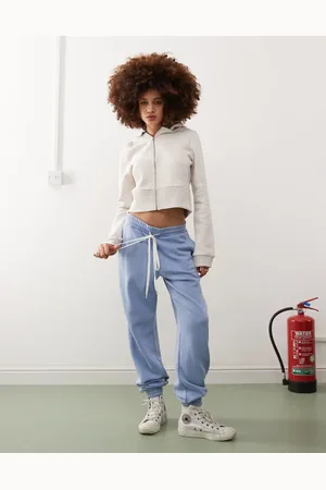 Monki – Jogginghose in verwaschenem Blau mit Bündchen