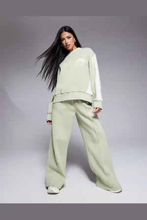 ASOS Weekend Collective – Oversize-Jogginghose in Salbeigrün mit Ski-Detail