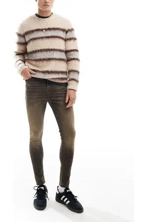 ASOS – Hautenge Jeans mit Power-Stretch in verwaschenem mit Spray-Tönung
