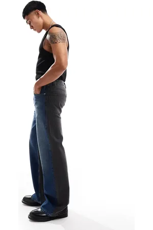 ASOS – Weite Schlagjeans in mittelblauer Waschung mit kontrastierendem Nahtdetail