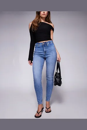 River Island – Jeans mit enger Schnitt und hohem Bund in mittelblauer Waschung