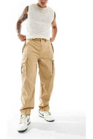 Superdry – Weite Fallschirmhose in Beige