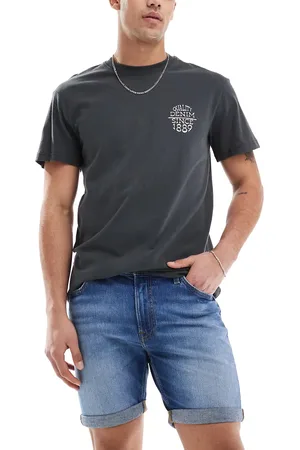 Lee – Rider – Schmal geschnittene Shorts in mittelblauer Waschung