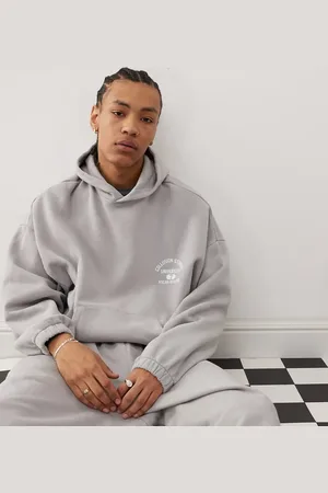 COLLUSION – Grauer Oversize-Kapuzenpullover mit Aufdruck und elastischen Bündchen