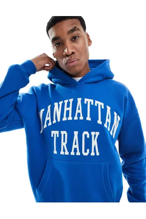 Hollister – Kastig geschnittener Kapuzenpullover in mit Motivprint