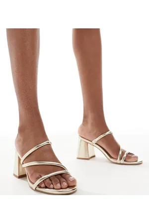 London Rebel London Rebel – Slip-on-Riemchensandalen in Gold mit Blockabsatz, weite Passform