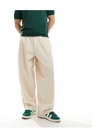 ASOS – Weite Oversize-Hose aus Cord in Creme mit Bundfalten