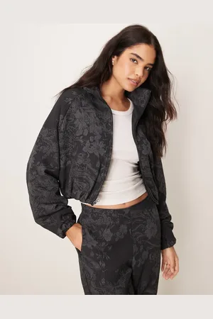Nike – MDC – Jacquard-Jacke in und Grau mit Blumenmuster