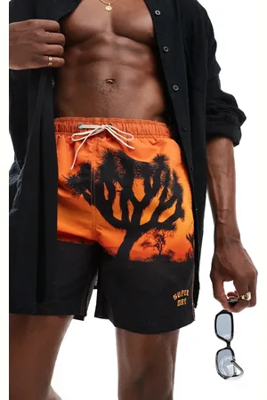 Superdry – Photographic – Badeshorts in mit Sonnenuntergang-Foto-Print, 17 Zoll