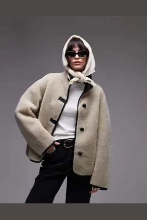 MANGO – Jacke aus Lammfell in Beige mit Stehkragen