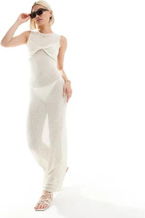 The Frolic – Exklusives, ärmelloses Maxi-Strandkleid aus Strick in Cremeweiß mit verdrehtem Design an der Brustpartie