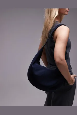 ARKET – Lässige, halbmondförmige Schultertasche aus Wildleder in