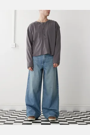 COLLUSION – X003 – Weit geschnittene Jeans in verwaschenem Mittelblau