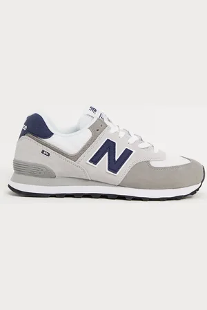 New Balance – 574 – Sneaker aus hellgrauem Wildleder