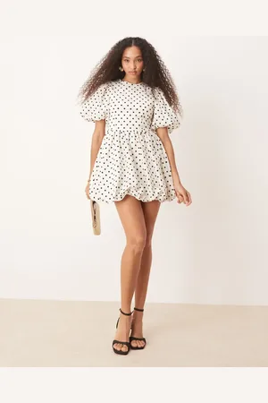 Sister Jane – Minikleid in gepunktetem Elfenbeinweiß mit Puffärmeln