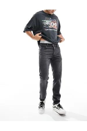 Lee – Rider – Schmal geschnittene Jeans in schattengrauer Waschung im Used-Look