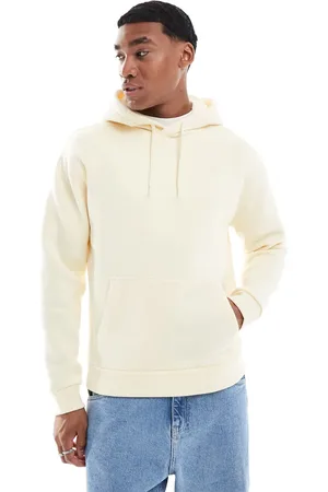Hollister – Lässig geschnittener Kapuzenpullover in Mandelbeige mit Logo