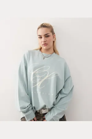 COLLUSION – Langärmeliges Oversize-Shirt mit Logo auf der Vorderseite